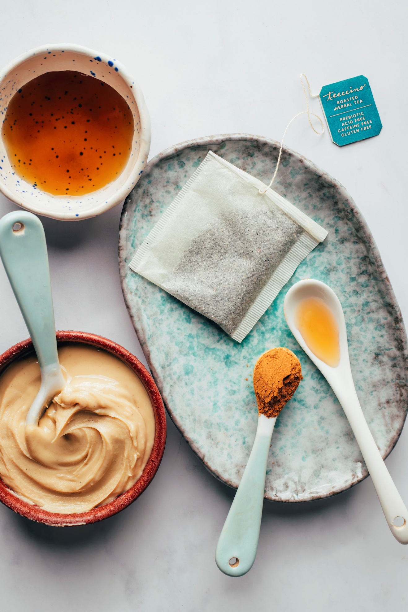 Teeccino tea bag, maple syrup, cashew butter, cinnamon, and vanilla